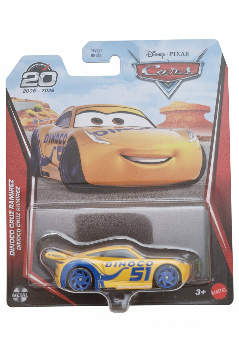 Disney Pixar Cars 20th Anniversary die-cast toy car of Cruz Ramirez in blister packaging, featuring a yellow and blue race car with the number 51.