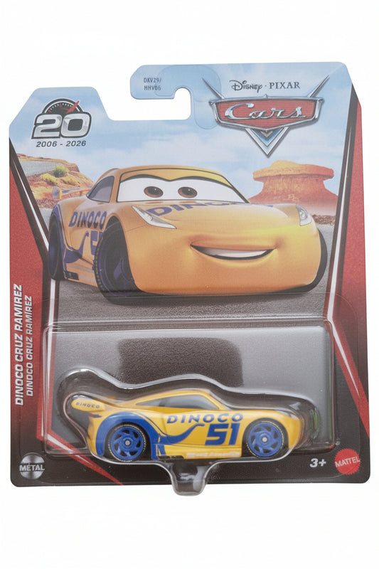 Disney Pixar Cars 20th Anniversary die-cast toy car of Cruz Ramirez in blister packaging, featuring a yellow and blue race car with the number 51.